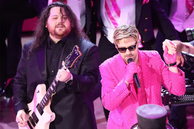 <p>Rich Polk/Getty</p> Wolfgang Van Halen and Ryan Gosling perform 'I'm Just Ken' at the 2024 Oscars