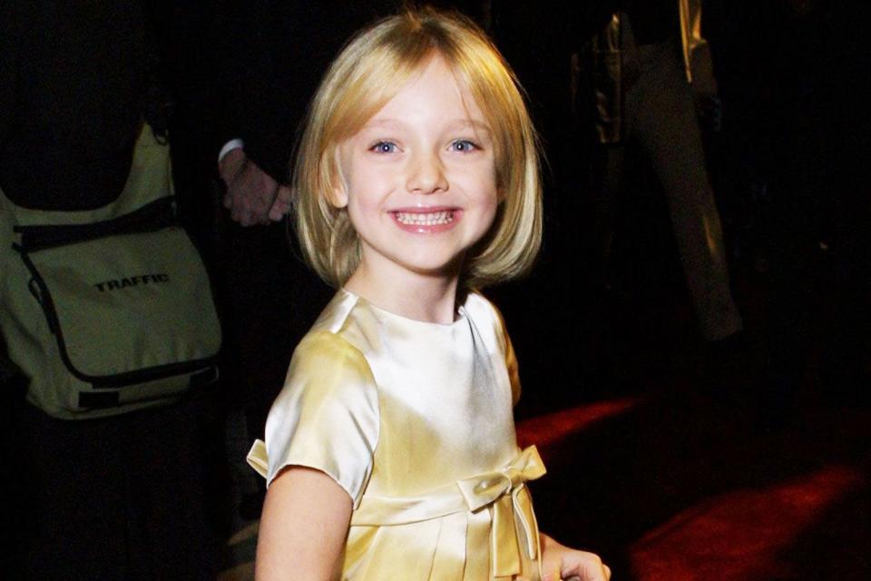 <p>Bei/Shutterstock </p> Dakota Fanning attends the 2001 premiere of 