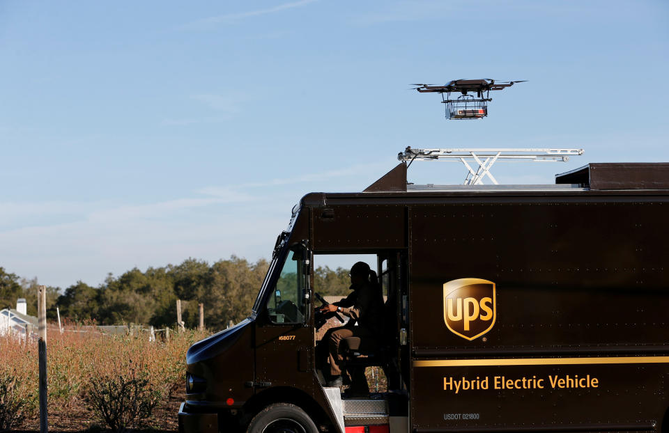 A drone demonstrates delivery capabilities from the top of a UPS truck during testing in Lithia, Florida, U.S. February 20, 2017. REUTERS/Scott Audette     TPX IMAGES OF THE DAY