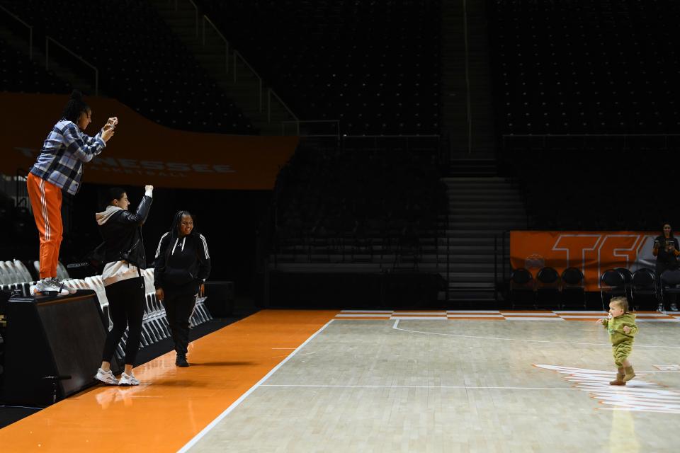 Candace Parker and wife Anna Petrakova photograph their son Airr Larry Petrakov Parker as he walks across The Summitt after the NCAA college basketball game between Tennessee and Georgia on Sunday, January 15, 2023 in Knoxville, Tenn.