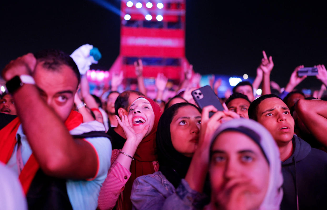 People attend the FIFA Fan Festival opening day ahead of the World Cup (Odd Andersen / AFP via Getty Images)