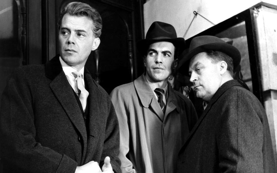 Cairney with Dirk Bogarde, left, and John Barrie in Basil Dearden's 1961 drama about homosexuality, Victim