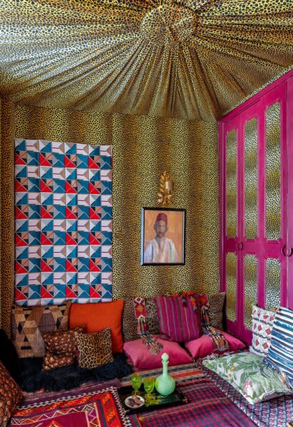 Franco-Iranian interior designer Maryam Mahdavi covered every last inch of this tented sitting area in a Paris apartment with bold colors and patterns.