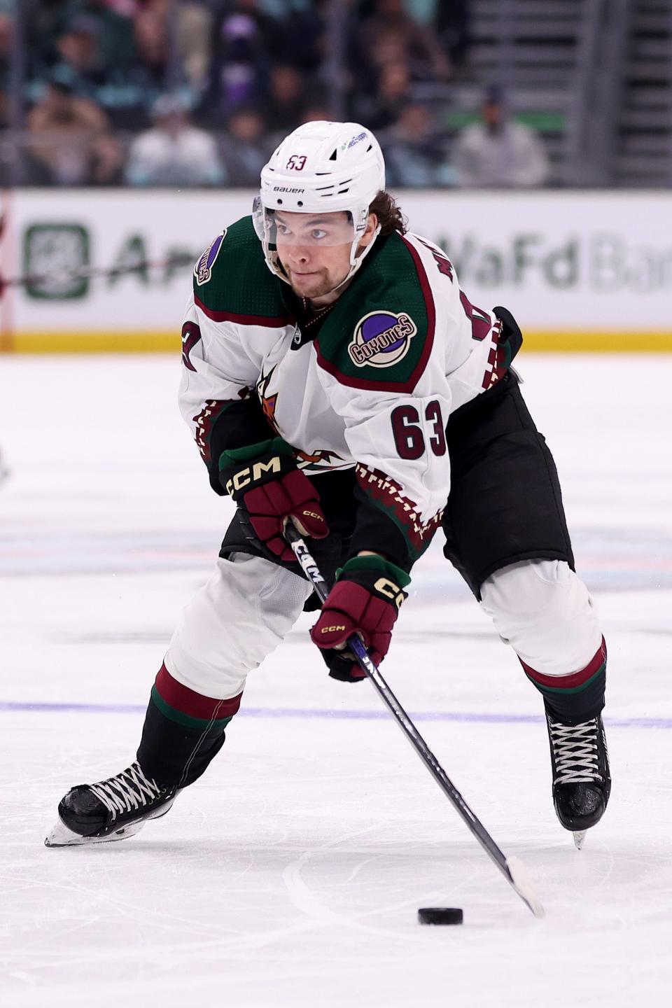 Matias Maccelli (63) of the Arizona Coyotes skates against the Seattle Kraken during the first period at Climate Pledge Arena on April 6, 2023, in Seattle, Wash.