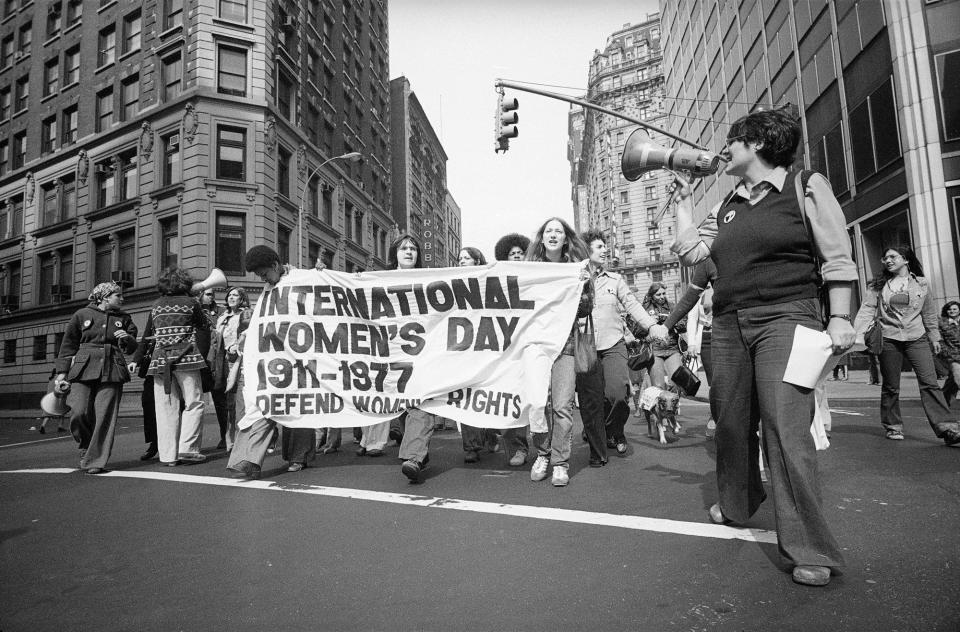 Participants in an International Women's Day demonstration march in 1977 in New York City.