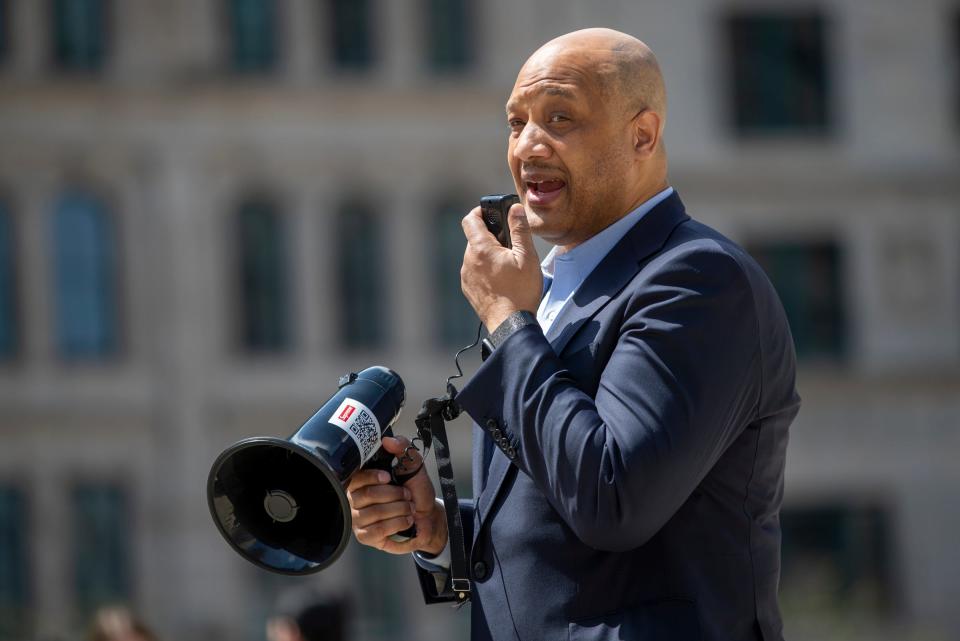 Congressman Andre Carson speaks on Sunday, April 18, on Monument Circle during a vigil for the eight people who were recently killed in an overnight shooting at a Fed Ex Ground Plainfield Operations Center on Indianapolis' southwest side. 