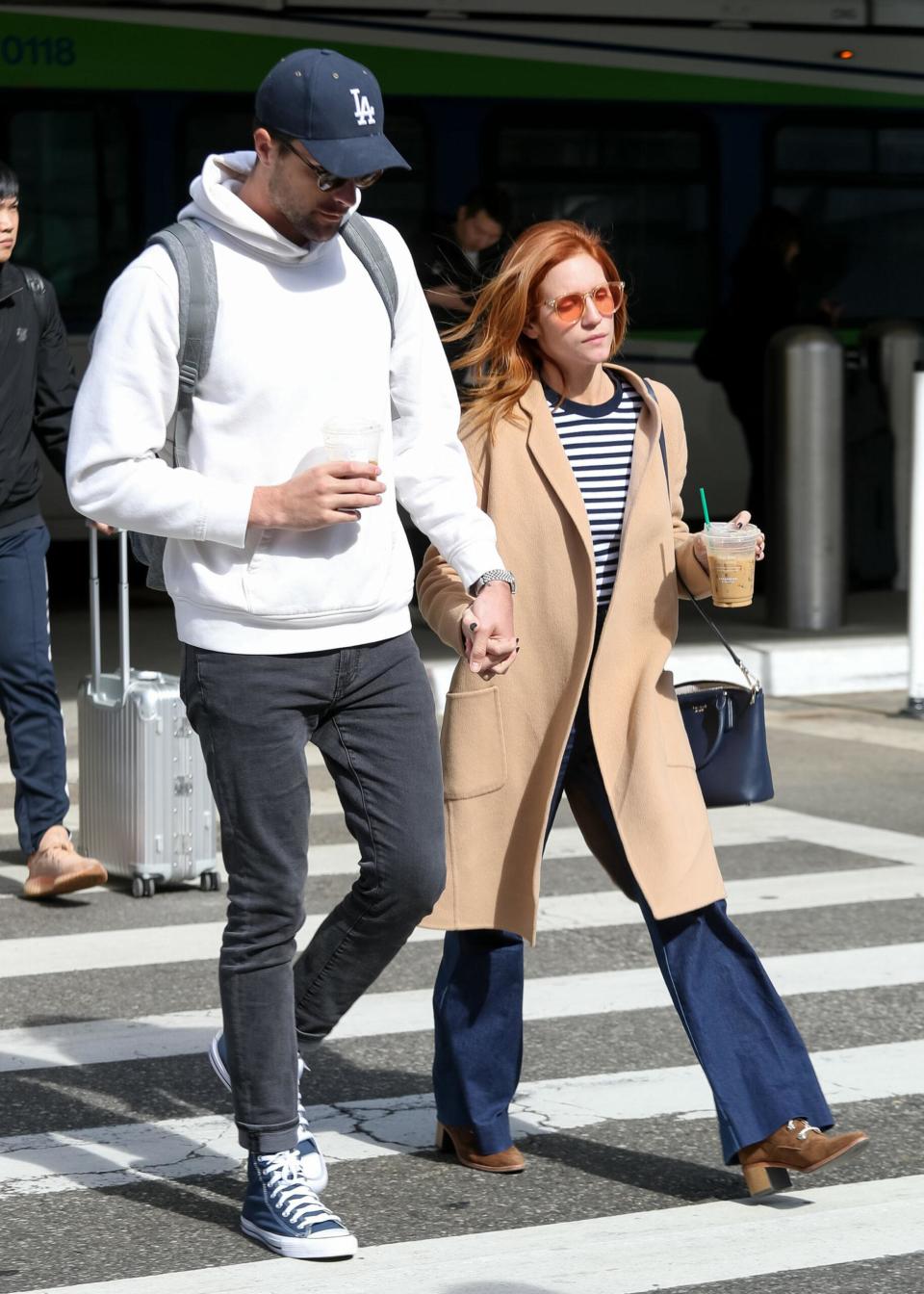 Brittany Snow and fiance Tyler Stanaland at LAX International Airport