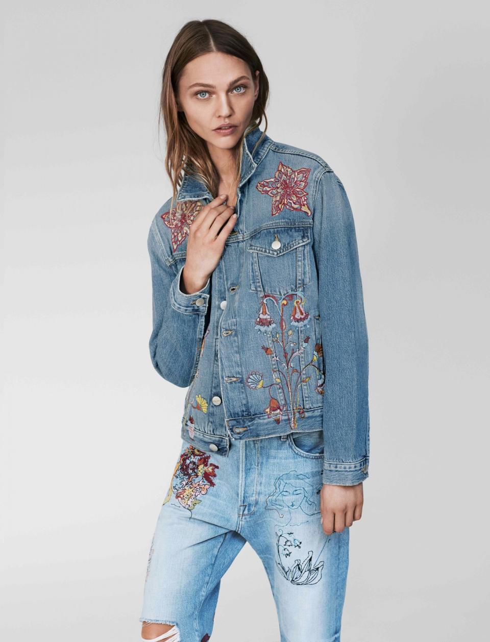 Sasha Pivovarova wears a Frame denim jacket and jeans featuring her original illustrations.