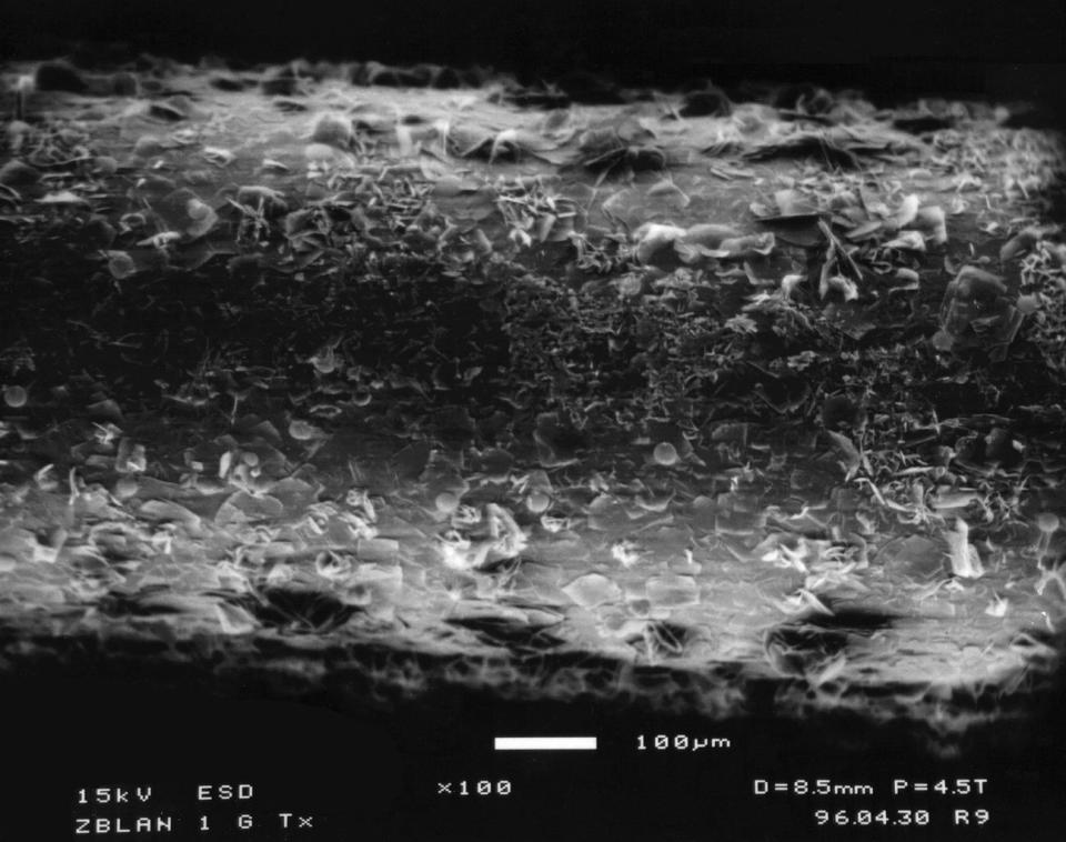 ZBLAN fibers processed on the ground have a tree-bark-like structure on the outside, whereas ZBLAN made in space doesn't show crystallization. <cite>NASA</cite>