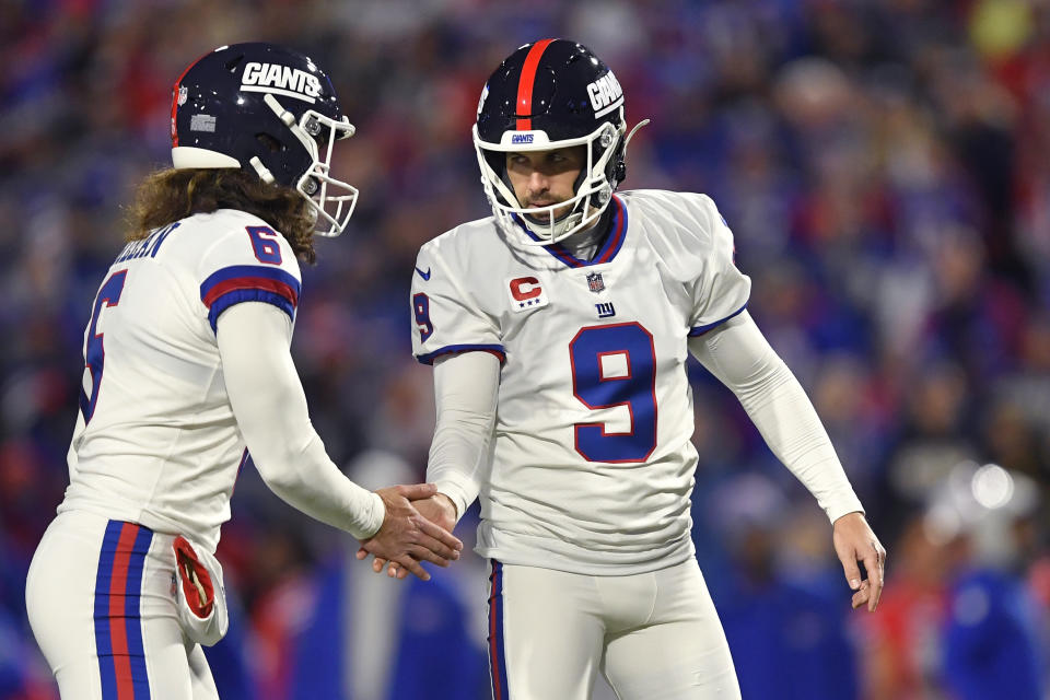 New York Giants kicker Graham Gano (9) is congratulated after kicking a field goal against the Buffalo Bills during the first half of an NFL football game in Orchard Park, N.Y., Sunday, Oct. 15, 2023. (AP Photo/Adrian Kraus)