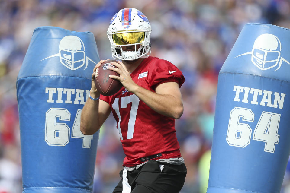 Buffalo Bills quarterback Josh Allen (17) takes part in a drill during practice at the NFL football team's training camp in Pittsford, N.Y., Monday July 25, 2022. (AP Photo/Joshua Bessex)