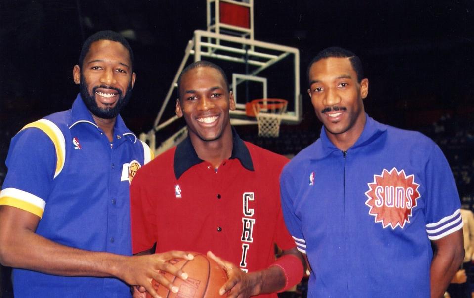 James Worthy (left), Michael Jordan and Walter Davis