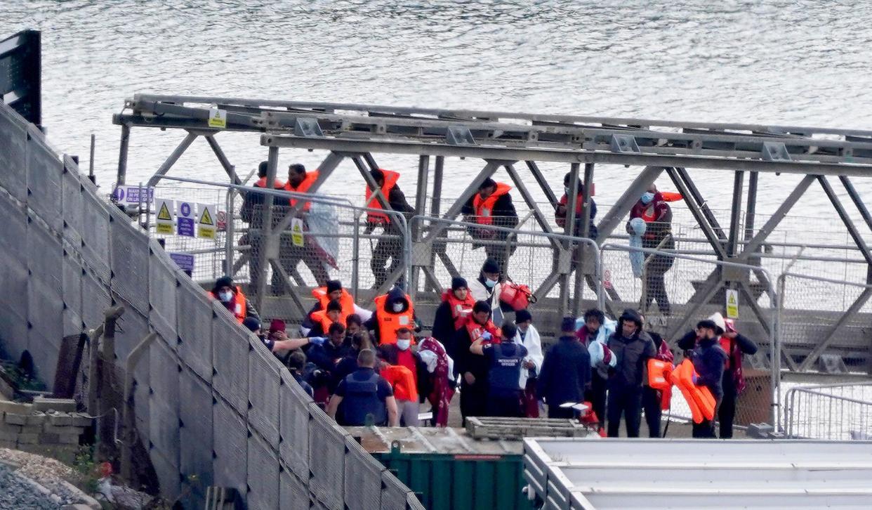 A group of people thought to be migrants are brought in to Dover, Kent, from a Border Force vessel following a small boat incident in the Channel. Picture date: Monday September 16, 2024.