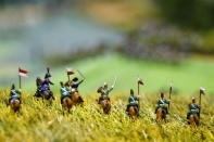 Figurines representing French Brigade of Lancers are seen on a 40-square-metre miniature model of the June 18, 1815 Waterloo battlefield, in Diest, Belgium, in this picture taken on April 29, 2015. REUTERS/Francois Lenoir