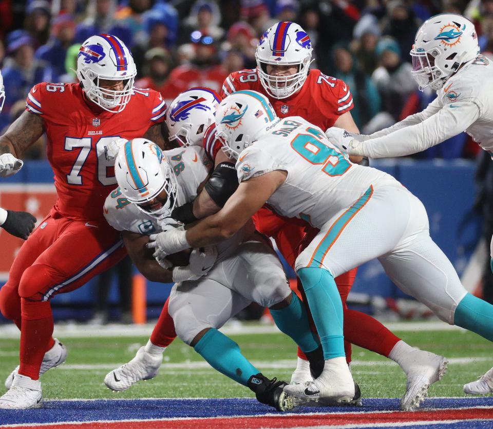 Miami’s Christian Wilkins recovers a Josh Allen fumble in the Dec. 17 game at Buffalo.