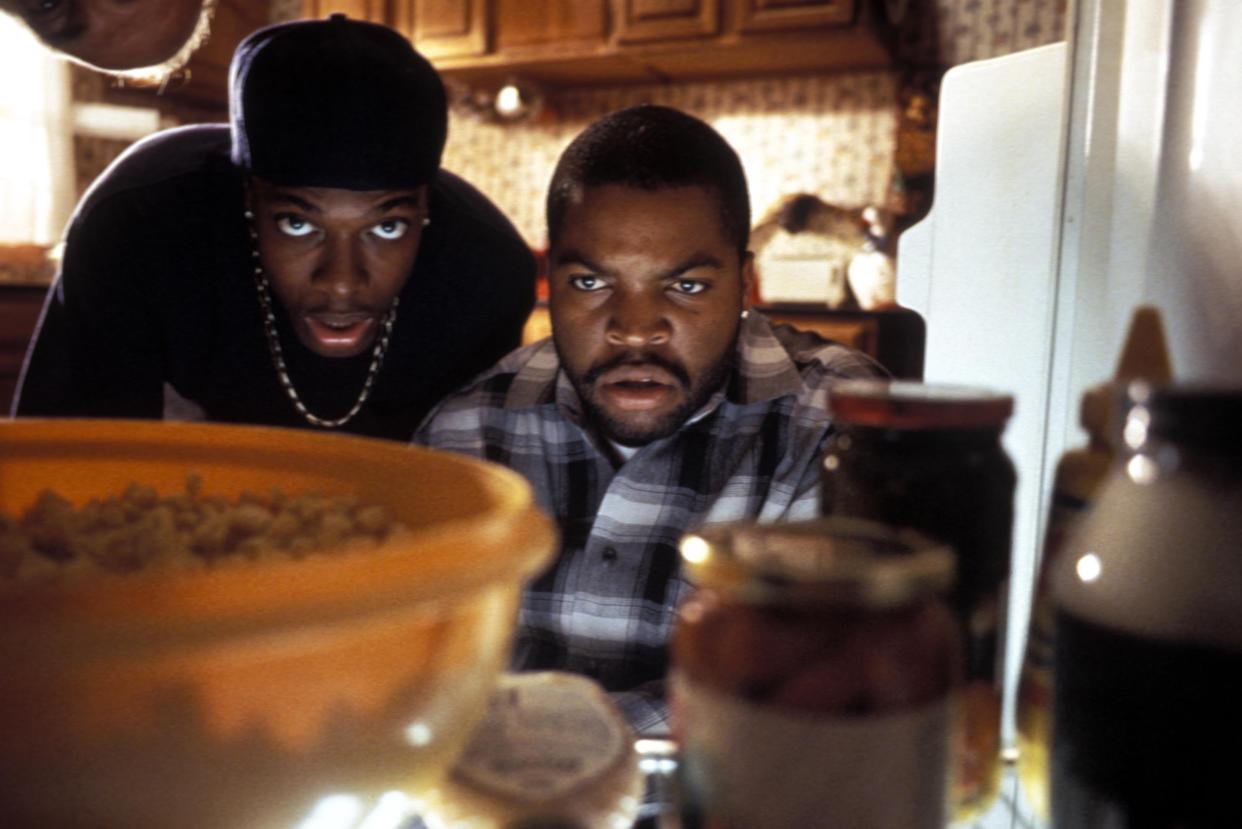 Chris Tucker, left, and Ice Cube struggle to repay their pot dealer in 1995's "Friday."