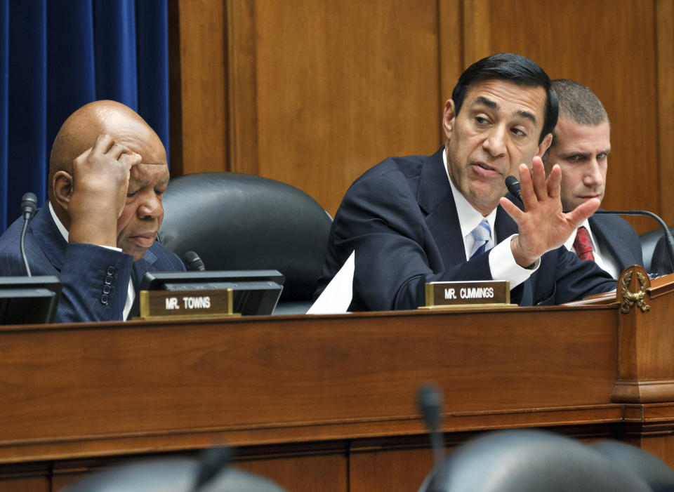 Rep. Darrell Issa, R-Calif., right, chairman of the House Oversight and Government Reform Committee, manages a series of amendments as they consider a vote to hold Attorney General Eric Holder in contempt of Congress, on Capitol Hill in Washington, Wednesday, June 20, 2012. Rep. Elijah Cummings, D-Md., the ranking member, watches from left. In a showdown with President Barack Obama's administration, House Republicans had pressed for more Justice Department documents on the flawed gun-smuggling probe known as Operation Fast and Furious that resulted in hundreds of guns illicitly purchased in Arizona gun shops winding up in the hands of Mexican drug cartels. (AP Photo/J. Scott Applewhite)