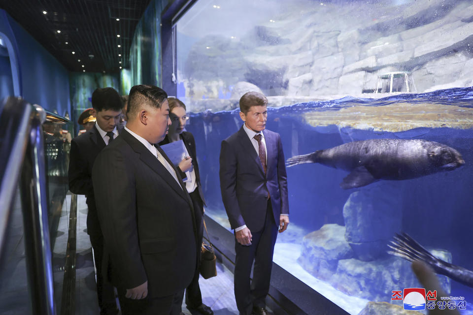 In this photo provided by the North Korean government, North Korea leader Kim Jong Un, front left, visits the Primorsky Aquarium in Vladivostok, Russian Far East Sunday, Sept. 17, 2023. Independent journalists were not given access to cover the event depicted in this image distributed by the North Korean government. The content of this image is as provided and cannot be independently verified. Korean language watermark on image as provided by source reads: "KCNA" which is the abbreviation for Korean Central News Agency. (Korean Central News Agency/Korea News Service via AP)