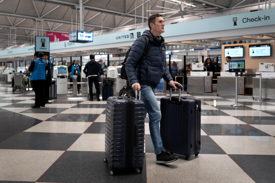 CHICAGO, ILLINOIS - APRIL 18: Travelers pass through O'Hare International Airport on April 18, 2024 in Chicago, Illinois. Airlines expect a record-breaking spring and summer travel season as demand for flights continues to be high. (Photo by Scott Olson/Getty Images)