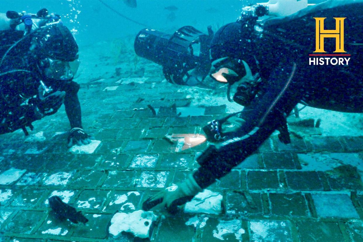 Photo Captions:Underwater explorer and marine biologist Mike Barnetteand wreck diver Jimmy Gadomskiexploring a twenty-foot segment of the 1986 Space Shuttle Challenger, the teamdiscovered in the waters off the coast of Florida during the filming of The HISTORY®Channel’snew series “The Bermuda Triangle: Into Cursed Waters”premiering Tuesday, November 22 at 10/9c.Photo Credits:The HISTORY® Channel