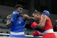 FILE - Cuba's Arlen Lopez, right, and Brazil's Wanderley De Souza compete in the men' 80kg boxing gold medal bout, at the Pan American Games in Santiago, Chile, Friday, Oct. 27, 2023.(AP Photo/Martin Mejia, File)