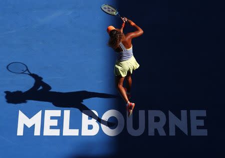 Tennis - Australian Open - Margaret Court Arena, Melbourne, Australia, January 22, 2018. Naomi Osaka of Japan in action against Simona Halep of Romania. REUTERS/David Gray