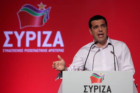 Greek Prime Minister Alexis Tsipras gestures as he delivers his speech during a central committee of leftist Syriza party in Athens, July 30, 2015. REUTERS/Yiannis Kourtoglou