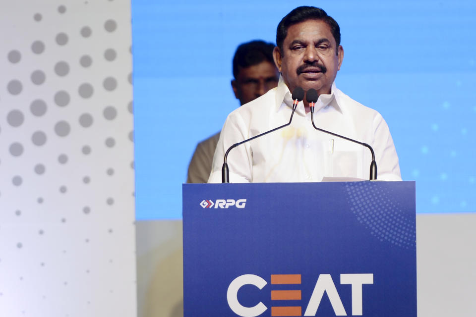 Managing Director of CEAT Tyres Anant Goenka (L) along with Chief Minister of Tamil Nadu Edappadi K. Palaniswami (2R) stand on stage during the inauguration of the CEAT Tyres plant in Chennai on February 12, 2020. (Photo by Arun SANKAR / AFP) (Photo by ARUN SANKAR/AFP via Getty Images)