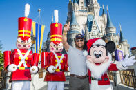 <p>The actor got into the holiday spirit on Monday, as he visited with a Santa-like Mickey Mouse and friends, at the Magic Kingdom Park at Walt Disney World Resort in Lake Buena Vista, Fla. (Photo: Steven Diaz/Disney Parks via Getty Images) </p>