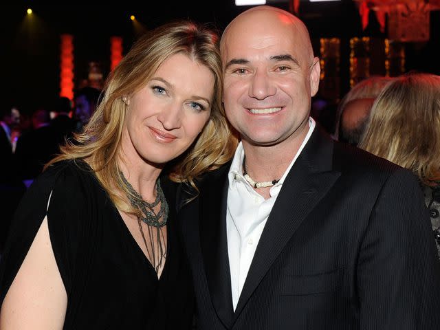 <p>Ethan Miller/Getty</p> Steffi Graff and Andre Agassi attend the Keep Memory Alive foundation's "Power of Love Gala" in 2012