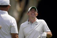 Rory McIlroy, of Northern Ireland, right, laughs with Paul Casey, of England, during a practice round of the U.S. Open Golf Championship, Tuesday, June 15, 2021, at Torrey Pines Golf Course in San Diego. (AP Photo/Gregory Bull)