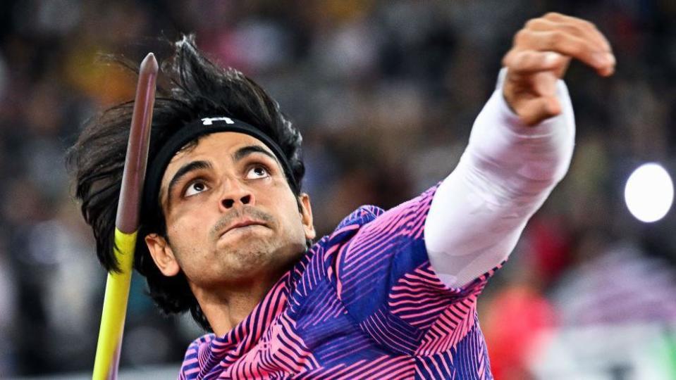 Neeraj Chopra throws the javelin