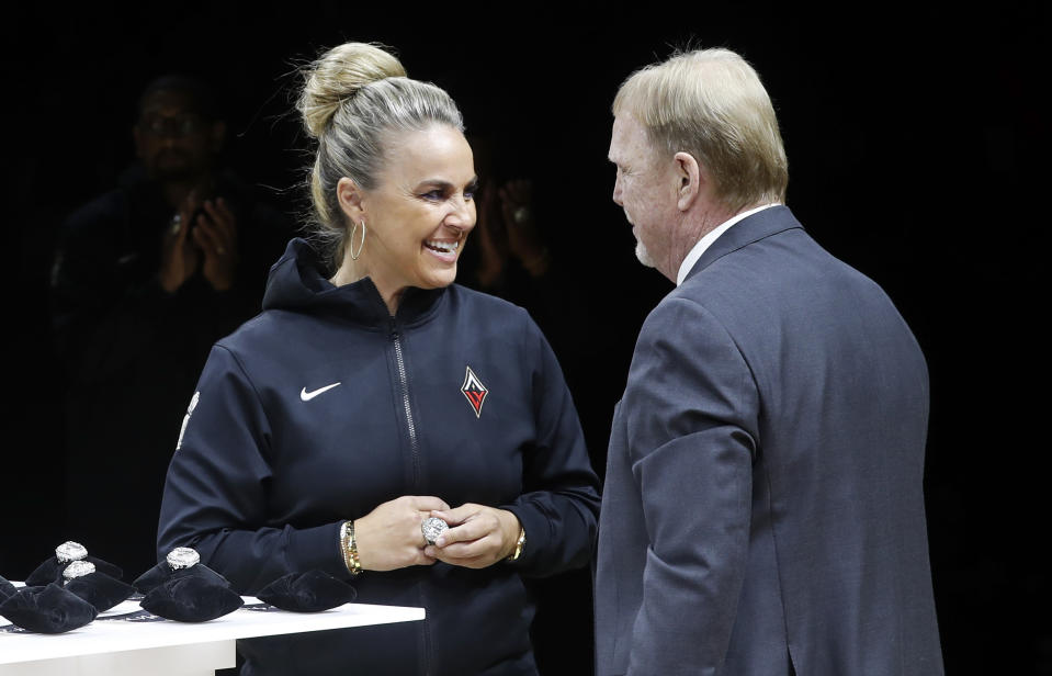 Las Vegas Aces head coach Becky Hammon receives her championship ring from team owner Mark Davis on Saturday night. (Photo by Steve Marcus/Getty Images)