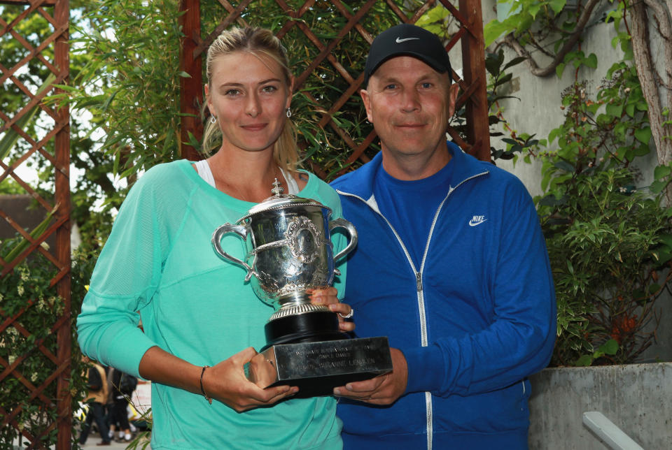 PARIS, FRANCE - JUNE 09:  Maria Sharapova of Russia poses with the Coupe Suzanne Lenglen next to her coach Thomas Hogstedt after her women's singles final against Sara Errani of Italy during day 14 of the French Open at Roland Garros on June 9, 2012 in Paris, France.  (Photo by Clive Brunskill/Getty Images)