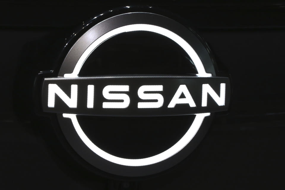 New Nissan Motor Co. logo is displayed at the global headquarters of Nissan Motor Co.,. in Yokohama near Tokyo, Wednesday, July 22, 2020. His boss Carlos Ghosn escaped financial misconduct charges by fleeing the country, but another former Nissan executive is still awaiting trial in Japan: Greg Kelly. Kelly's trial in Tokyo District Court opens Sept. 15, nearly two years after his arrest, and the same day he turns 64 . If convicted of charges related to alleged under-reporting of Ghosn's income, Kelly could face up to a decade in prison. (AP Photo/Koji Sasahara)