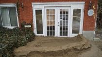 This couple stayed up all night to keep flood water out of their home