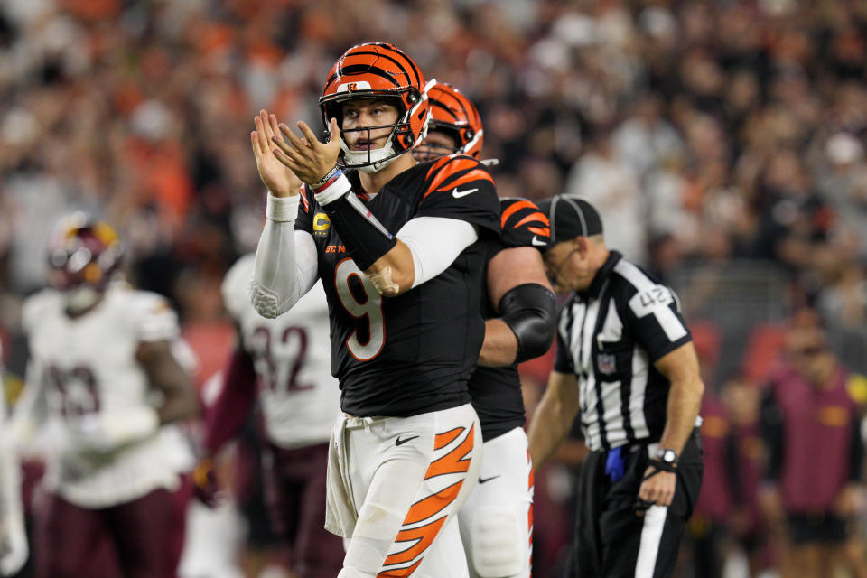 Cincinnati Bengals quarterback Joe Burrow (9) celebrates after throwing a touchdown pass during the second half of an NFL football game against the Washington Commanders, Monday, Sept. 23, 2024, in Cincinnati. (AP Photo/Jeff Dean)