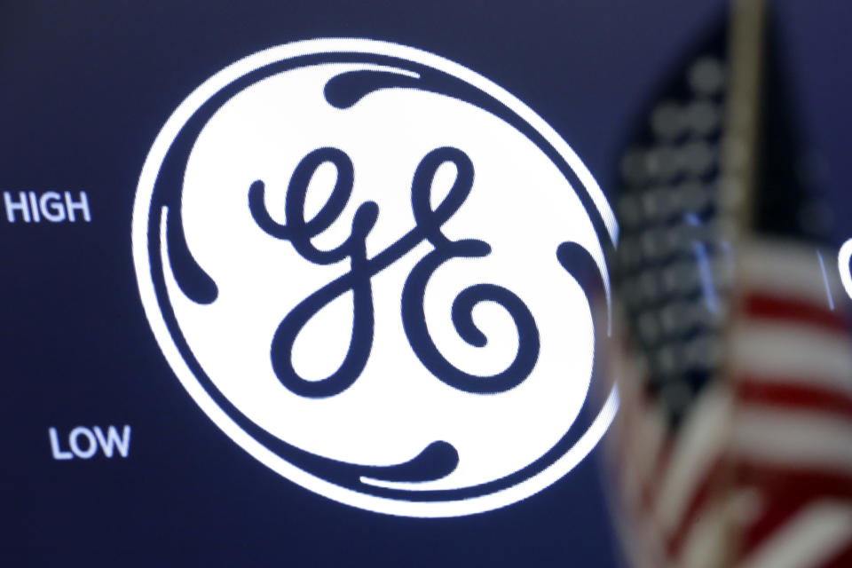 The General Electric logo appears above a trading post on the floor of the New York Stock Exchange, Tuesday, June 26, 2018. (AP Photo/Richard Drew)