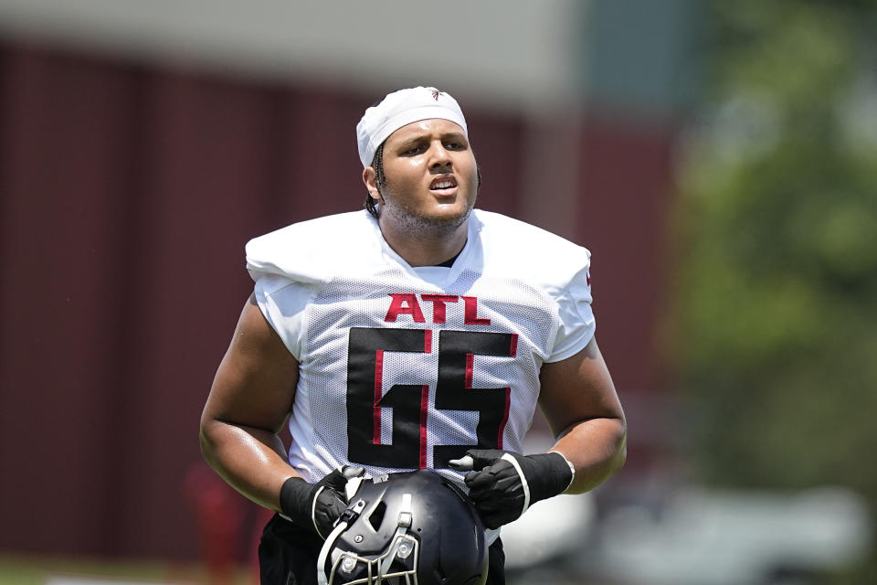 Atlanta Falcons offensive lineman Matthew Bergeron (65) runs drills during the NFL football team's rookie minicamp, Saturday, May 13, 2023, in Flowery Branch, Ga. (AP Photo/Brynn Anderson)