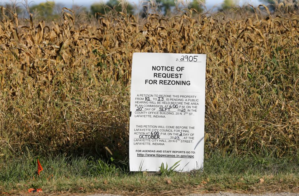 A rezone request sign that sits outside of Gabriel Deise's parent's house after Irving Materials Inc. filed a request with the Tippecanoe County Area Planning Commission and City of Lafayette to allow the company to rezone property that sits along South 100 West, on Thursday, Oct. 12, 2023, in Lafayette, Ind.