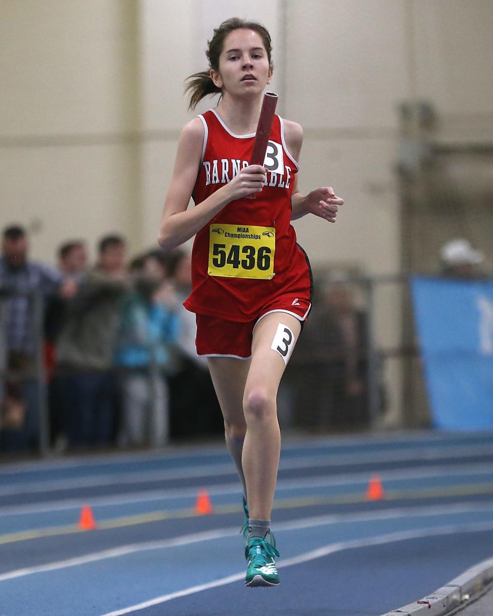 Barnstable’s Chloe Dibb competes in the 4X800 meter relay race at the MIAA Meet of Champions at the Reggie Lewis Track Center in Boston on Saturday, Feb. 25, 2023.