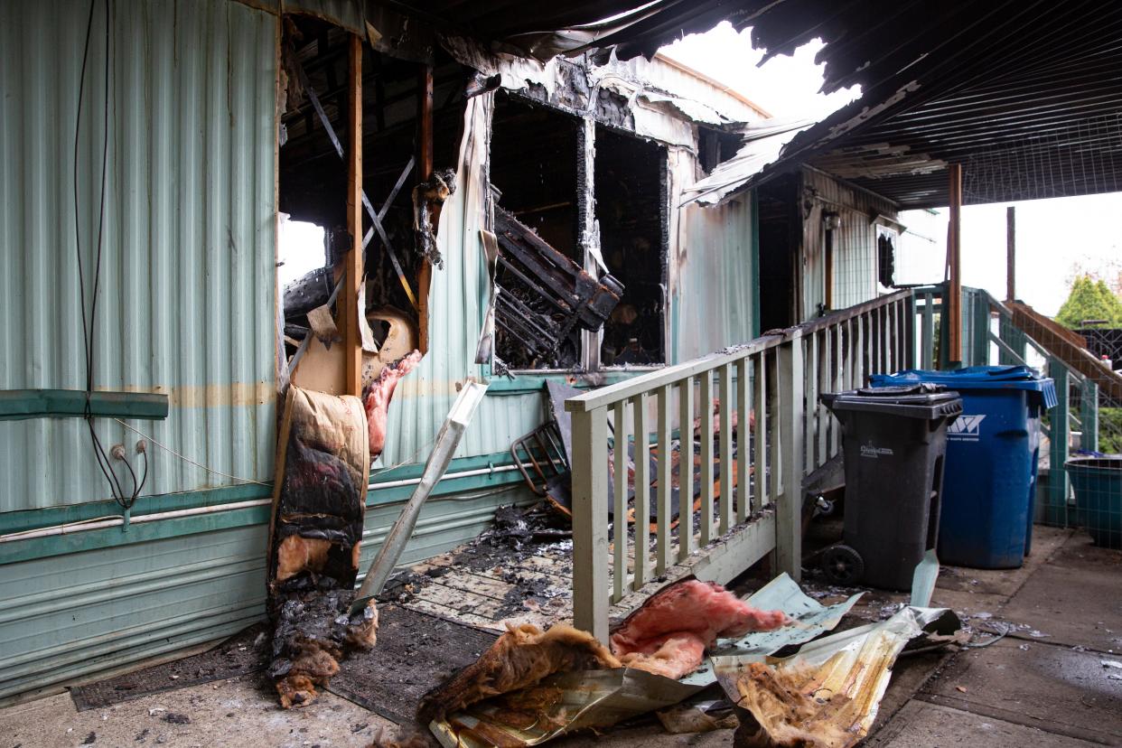 The front of a mobile home in northeast Salem that was fully engulfed in flames Wednesday afternoon when firefighters arrived and found a man inside.