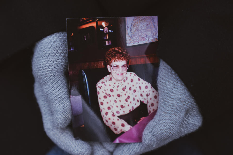 Deborah Mastromano holds a photo of her mother, Betty Coleman. (Jeenah Moon / for NBC News)