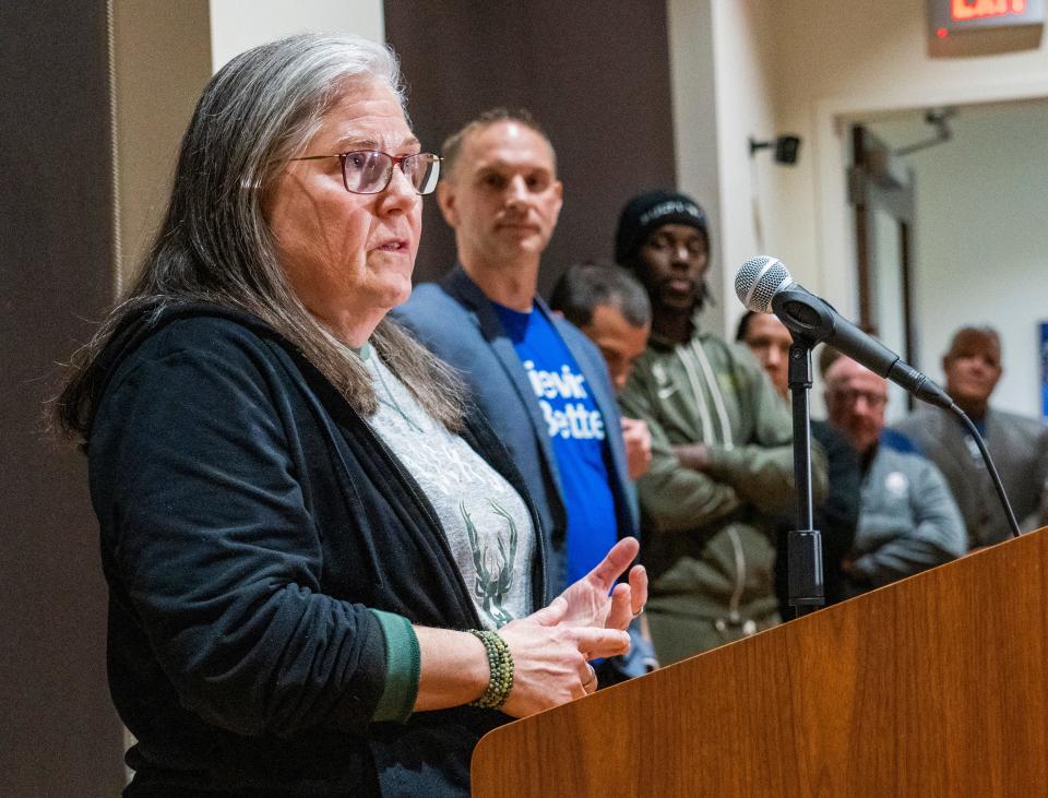 Carmen Pitre, President and CEO of Sojourner Family Peace Center, speaks at a press conference in 2023.