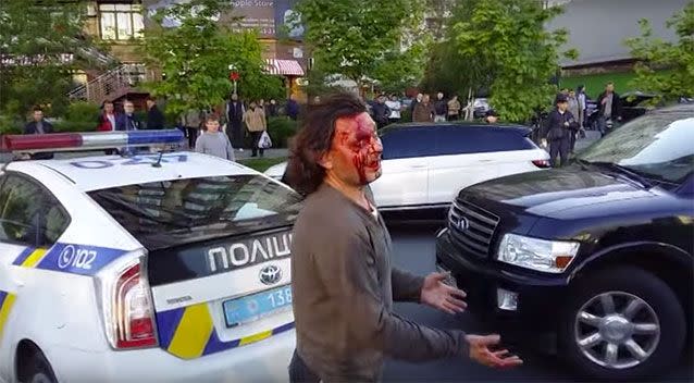 The blow opens a crack in his head. Source: Road Control/Ukranian Pravda
