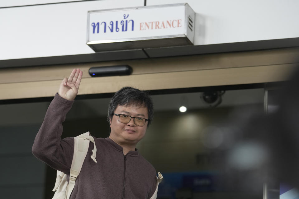 Arnon Nampa raises a three-fingers salute, a symbol of resistance, before entering the Criminal court Tuesday, Sept. 26, 2023. The prominent Thai human rights lawyer was convicted on Tuesday of insulting the monarchy and sentenced to four years in prison, the first conviction under a controversial law guarding the royal institution since a civilian government took office after years of military-backed rule.(AP Photo/Sakchai Lalit)