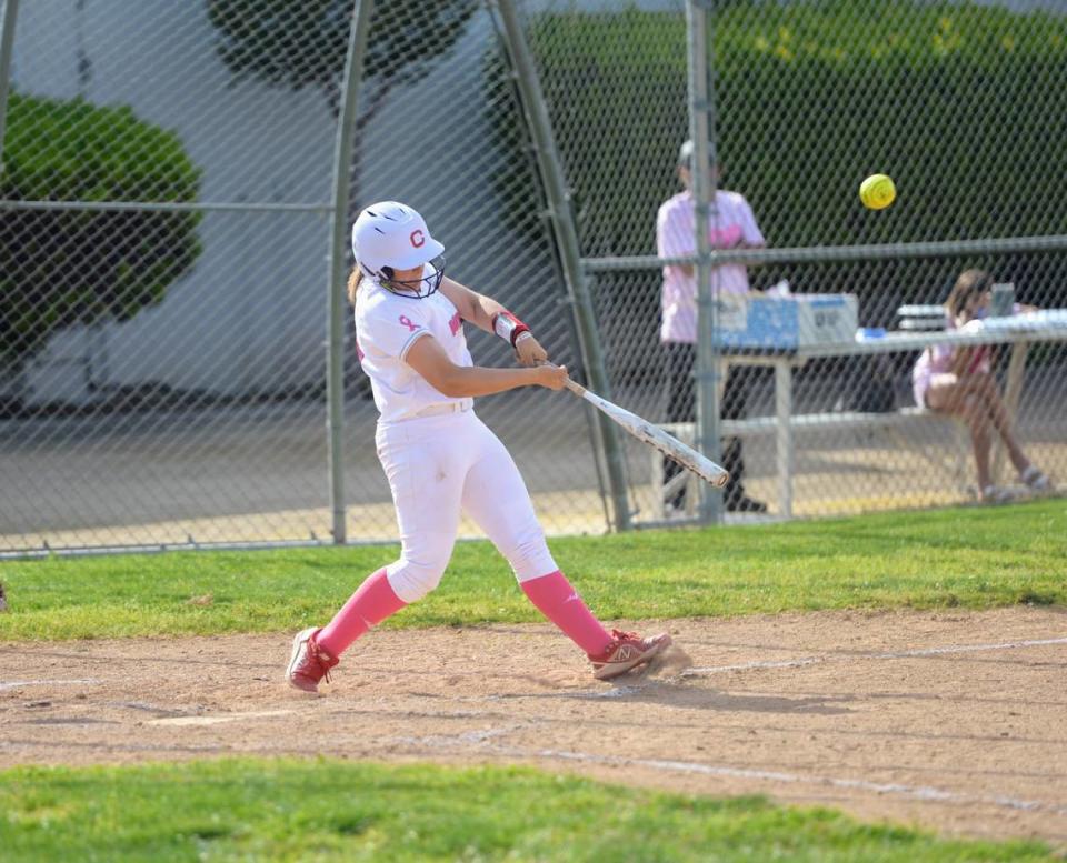 Ceres’ Kyleigh Robinson makes contact with a pitch during a Western Athletic Conference matchup against Pacheco at Ceres High in Ceres, Calif. on Thursday, April 25, 2024.