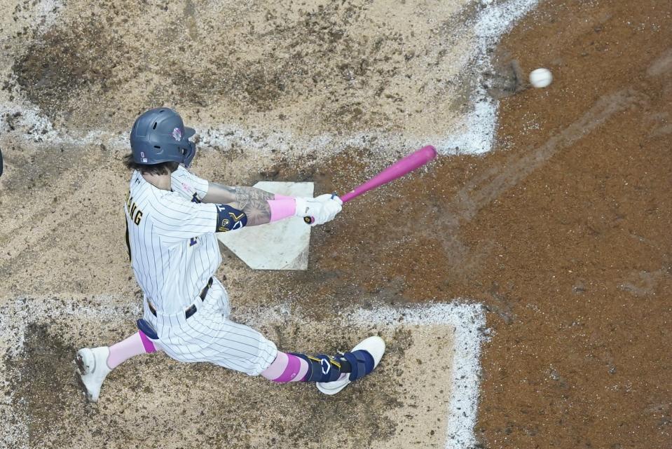 Milwaukee Brewers' Brice Turang hits a three-run home run during the third inning of a baseball game against the Kansas City Royals Sunday, May 14, 2023, in Milwaukee. (AP Photo/Morry Gash)