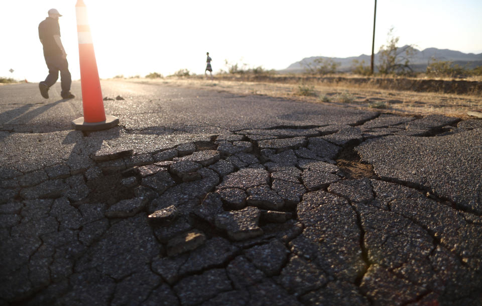 Cracks in the road after a 6.4 magnitude earthquake struck the area on July 4, 2019 near Ridgecrest, California. Source: Getty Images