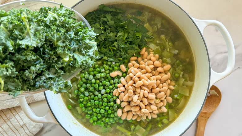 adding kale to pot